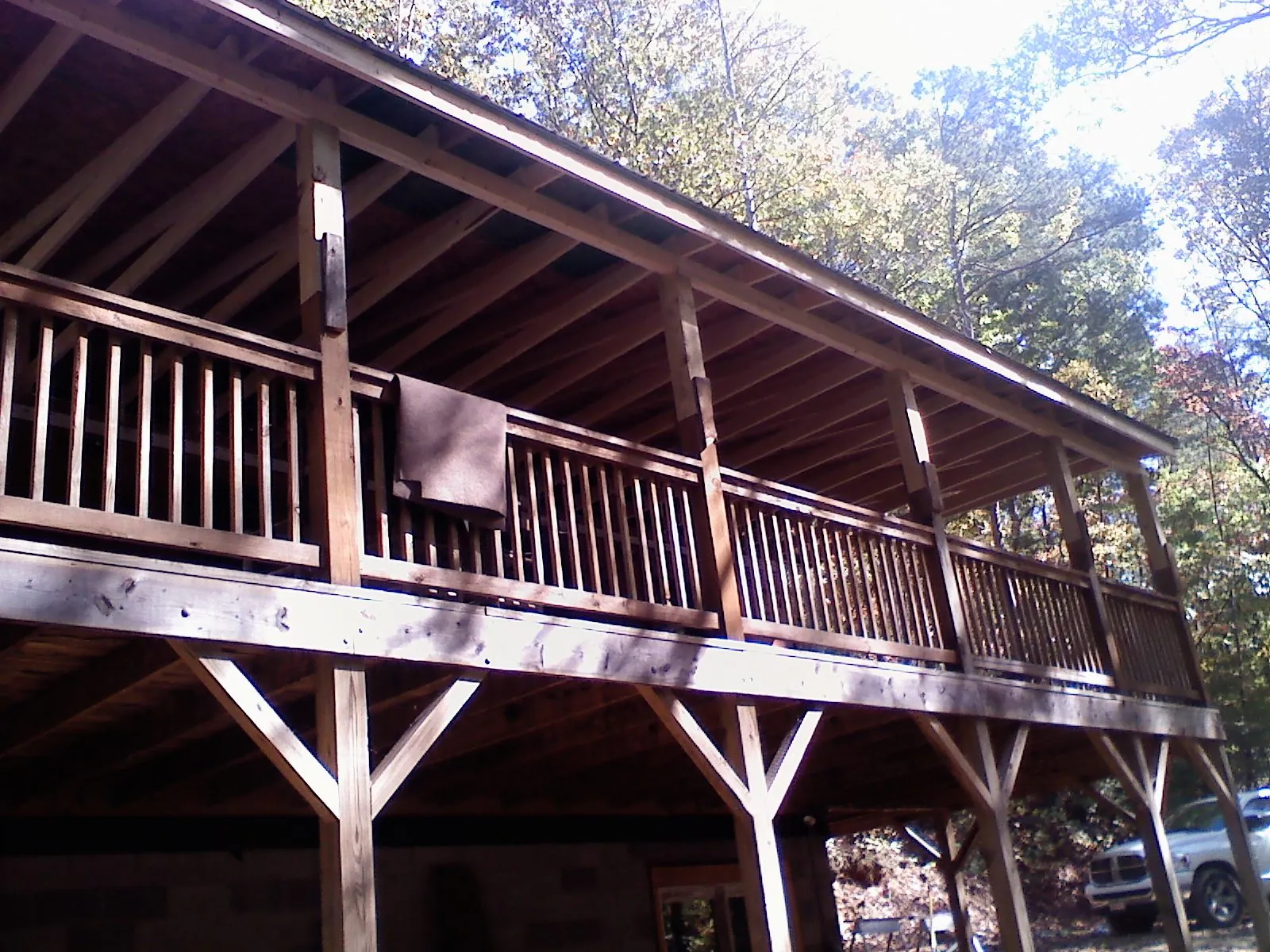 Timber framing under a new elevated porch and deck in West Alexandria